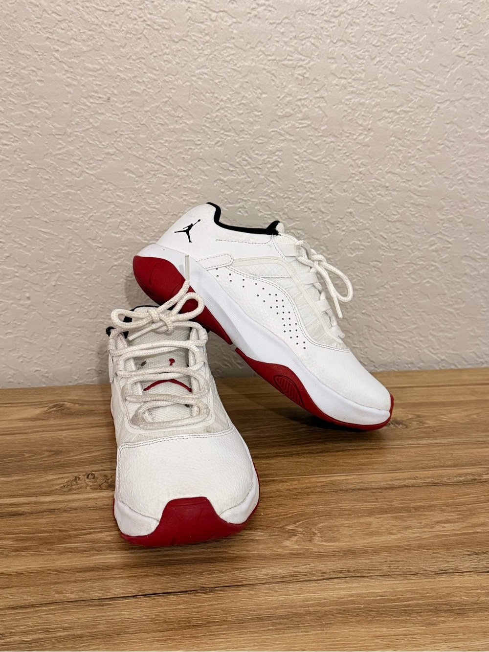 Air Jordan 11 Youth White & Red Low-Top Sneakers